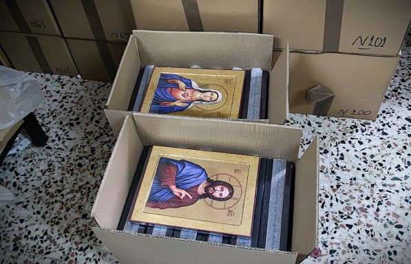Secure Packaging for Worldwide Shipping Two packaged Orthodox icons placed securely in shipping boxes ready for dispatch