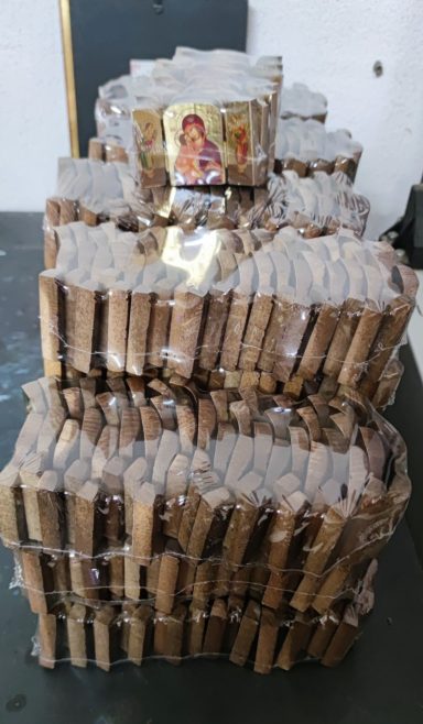 Finished Icons Ready for Final Check Stacked handcrafted Orthodox icons prepared for final inspection and shipping