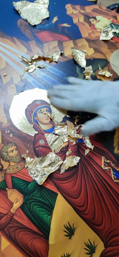 Gold Leaf Refinement Refining and adjusting gold leaf details on an Orthodox icon