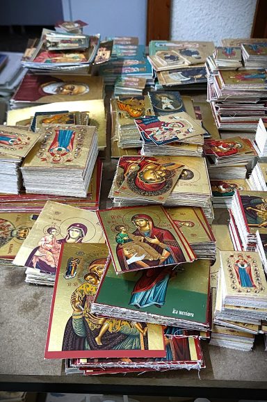 Icon Cutting Preparation Stacks of printed Orthodox icon sheets prepared for cutting