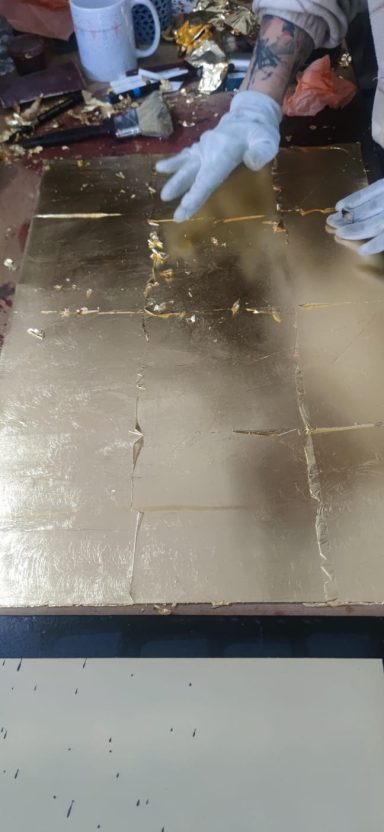 Gold Leaf Smoothing Process Pressing and smoothing genuine gold leaf on an Orthodox icon